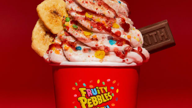 Ice cream topped with Fruity Pebbles cereal.